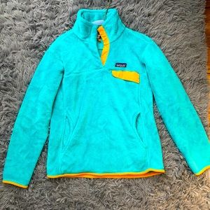 Teal and orange Patagonia Snap T synchilla